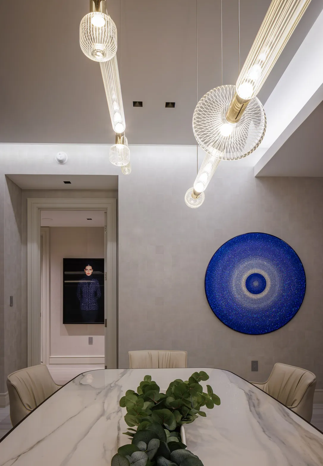 Dining room with Lasvit glass pendants, marble table and Stefano Curto blue crystal artwork, Acqualina 2303, Sunny Isles Beach